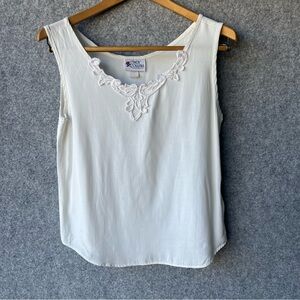 Cindy Collin’s Ivory Sleeveless Blouse